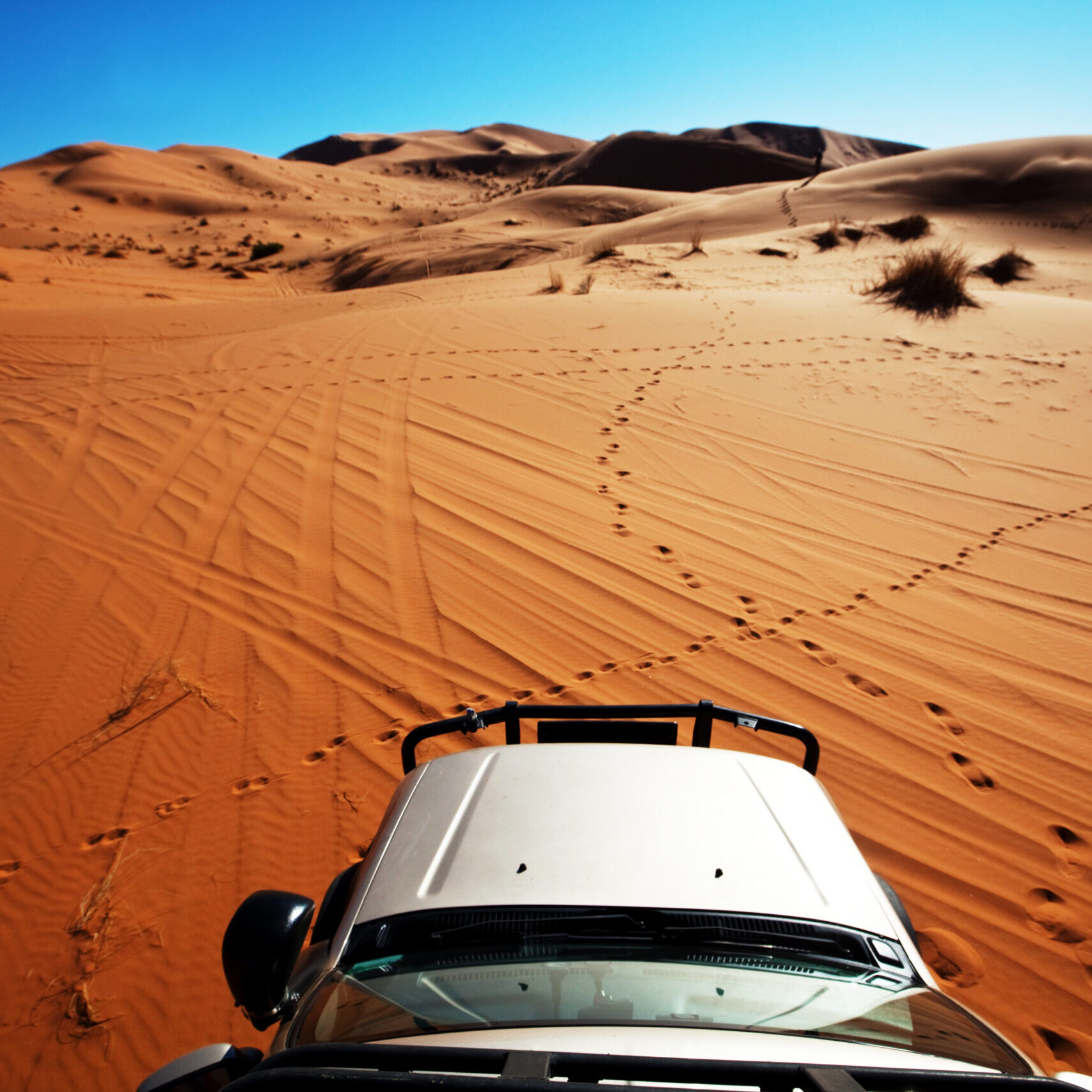 4x4 vehicle driving off road in Sahara desert, Morocco, Africa